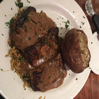 Trapper's Fishcamp & Grill - Blacken pork loin, dirty rice & bake potatoes - Seafood Near Me - Oklahoma City, Oklahoma Trapper's Fishcamp & Grill - Blacken pork loin, dirty rice & bake potatoes - Seafood Near Me - Oklahoma City, Oklahoma