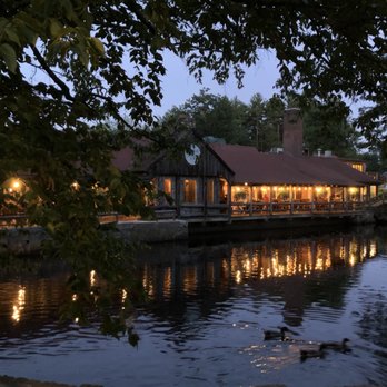 The 1761 Old Mill - The restaurant at night view from the street across the duck pond. - American Near Me - Westminster, Massachusetts