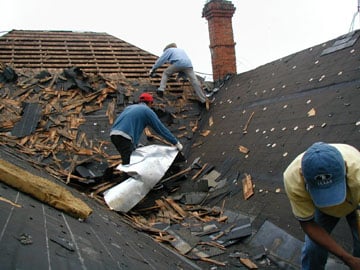 Slide of Armadillo Roofing & Exteriors