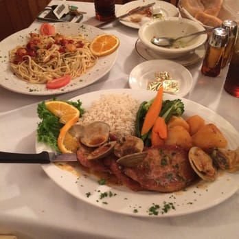 Omanel Restaurant - Shrimp Scampi w/linguini, & pork strips with clams. - Portuguese Near Me - Bridgeport, Connecticut