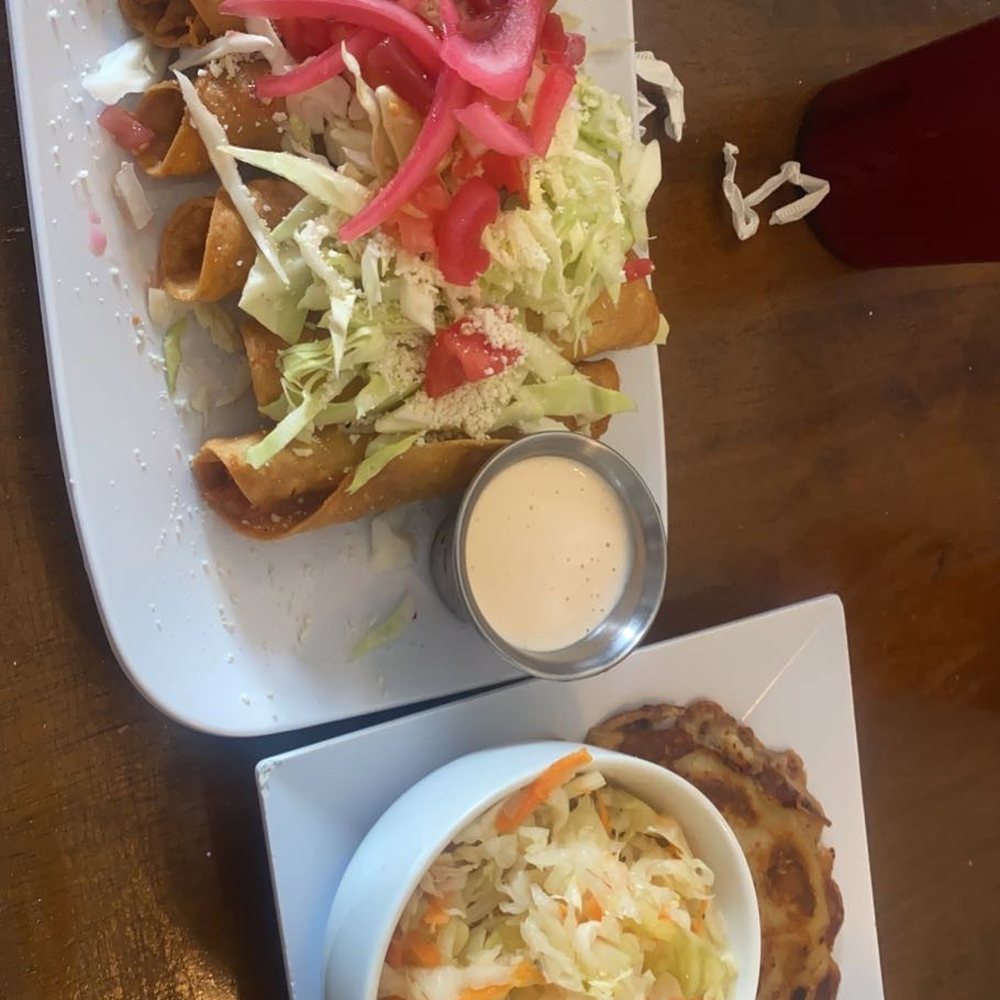 (LEFT) Hondurian Tacos (RIGHT) pupusa revuelta (LEFT) Hondurian Tacos (RIGHT) pupusa revuelta