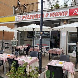 Pizzeria O Vesuvio - It's cozy, friendly, accomendating. The pizza is delicious & the menu is in English and Italian.