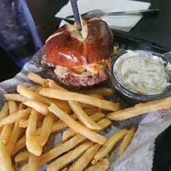 MILE BURGER on pretzel bun, Cole slaw and fries $14.99