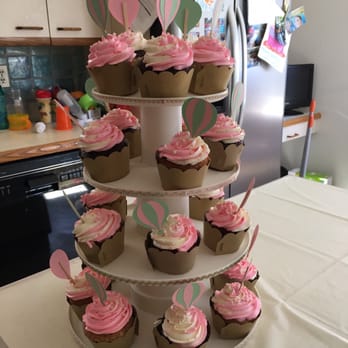 Breadsong Bakery - a tiered cupcake display - Bakeries Near Me - Auburndale, Massachusetts