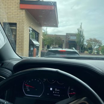 Dunkin' -  the dashboard of a car - Donuts Near Me - Fuquay Varina, North Carolina