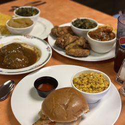 Tae’s Soul Food Restaurant - Meatloaf meal, Whiting fish sandwich meal, fried wings meal. Cornbread, fried corn, yams, collard greens on the side.