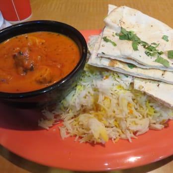 Masala WOk - spicy version of chicken tika masala and garlic nan with basmati rice - Indian Near Me - Austin, Texas