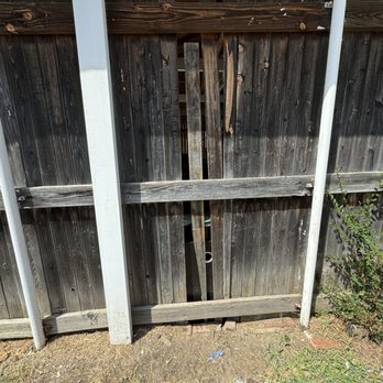 Evergreen Property Company - a hole moly fence - Property Management Near Me - Austin, Texas