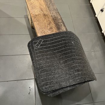 Proof Fitness - piss soaked urinal floor mat conveniently air drying on a bench you sit on, as one does, whilst mopping urinals with disgusting mop water - Trainers Near Me - Lexington, Kentucky