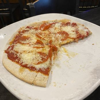 Johnny Carino's - Added about a cup of cheese to this bland, greasy, undercooked mess of a pizza. Pepperoni & Pepperoni - Italian Near Me - Pigeon Forge, Tennessee Johnny Carino's - Added about a cup of cheese to this bland, greasy, undercooked mess of a pizza. Pepperoni & Pepperoni - Italian Near Me - Pigeon Forge, Tennessee