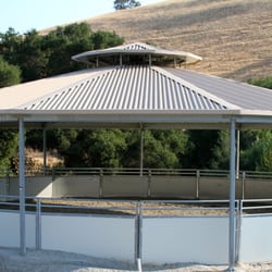2 round pens, one covered, with rubber matted sides and excellent updated sand footing for safe and productive lunging.