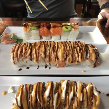 Aha Oriental Kitchen - (Back to front) Rainbow Roll Baked Salmon Roll Las Vegas Roll - Sushi Bars Near Me - Fairbanks, Alaska Aha Oriental Kitchen - (Back to front) Rainbow Roll Baked Salmon Roll Las Vegas Roll - Sushi Bars Near Me - Fairbanks, Alaska