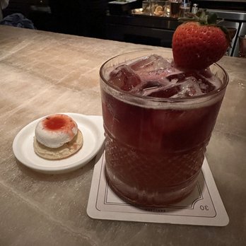 Bandista - Strawberry Fields accompanied by a Lemon Cookie w/ a Goat Cheese and Peppercorn Donut and a Strawberry Syrup Drizzle - Cocktail Bars Near Me - Houston, Texas