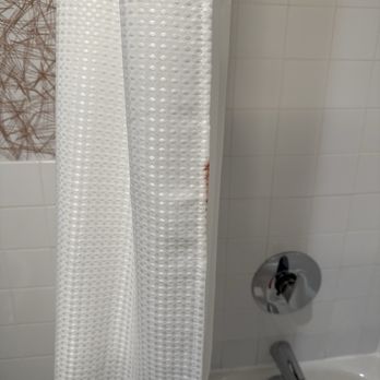 The Longleaf Hotel - Either blood or some other dark red substance on the shower curtain. Gross! - Hotels Near Me - Raleigh, North Carolina