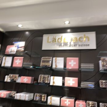 Läderach - a display of chocolates - Chocolatiers & Shops Near Me - Aventura, Florida