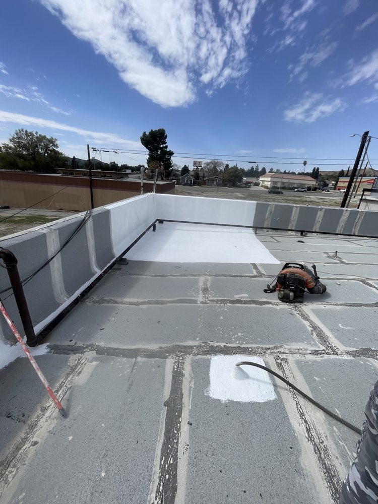 Slide of A Town Roofing
