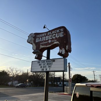 Terry Black's Barbecue - Terry Black's sign calling y'all right over - Barbeque Near Me - Lockhart, Texas