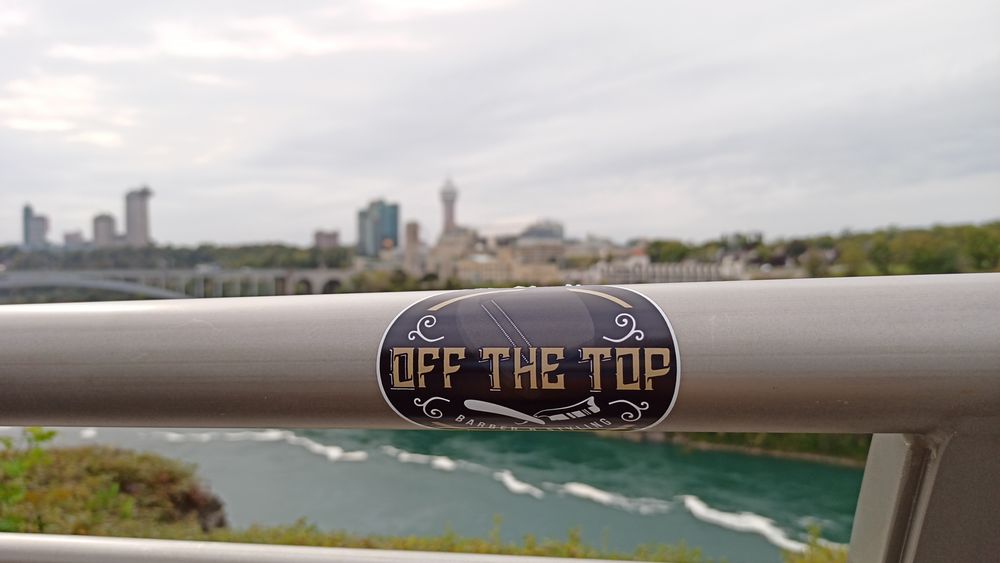 OFF THE TOP barber & styling Logo