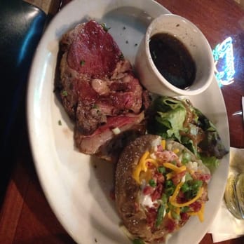 Ballyhoo Grill - Prime rib, gross! & their "garnish" was spinach leaves with salad dressing! Weird to me & the baked potato tasted microwaved! - Seafood Near Me - Gainesville, Florida