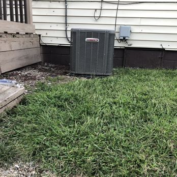 LawnGuru - an air conditioner outside a house - Snow Removal Near Me - Novi, Michigan LawnGuru - an air conditioner outside a house - Snow Removal Near Me - Novi, Michigan