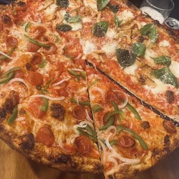 La Bella Pizza - Half Margarita, half pep - Pizza Near Me - Fredericksburg, Virginia La Bella Pizza - Half Margarita, half pep - Pizza Near Me - Fredericksburg, Virginia