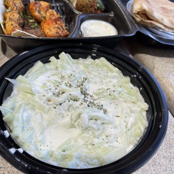 Taza Food Style - Cucumber marinated in a creamy, yummy tziki-style dressing and herbs- delicious! - Mediterranean Near Me - Cypress, Texas Taza Food Style - Cucumber marinated in a creamy, yummy tziki-style dressing and herbs- delicious! - Mediterranean Near Me - Cypress, Texas
