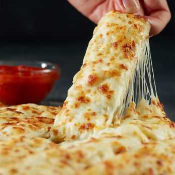 Papa Johns Pizza - a hand holding a piece of cheese pizza - Pizza Near Me - Wrightstown, New Jersey Papa Johns Pizza - a hand holding a piece of cheese pizza - Pizza Near Me - Wrightstown, New Jersey