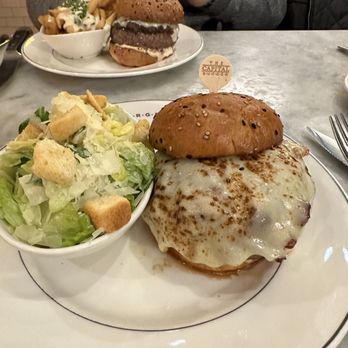The Capital Burger - Cheesy fries on the other plate! - Burgers Near Me - Boston, Massachusetts The Capital Burger - Cheesy fries on the other plate! - Burgers Near Me - Boston, Massachusetts