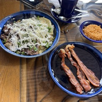 S & J Gran Cafe - Carne Asada chilaquiles with a side of bacon - Breakfast & Brunch Near Me - Orange, California S & J Gran Cafe - Carne Asada chilaquiles with a side of bacon - Breakfast & Brunch Near Me - Orange, California