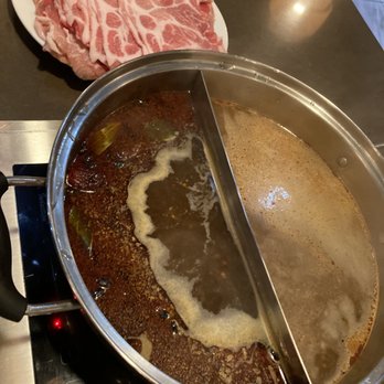 Lang Restaurant - two pans of food being cooked - Hot Pot Near Me - St. Catharines, Ontario Lang Restaurant - two pans of food being cooked - Hot Pot Near Me - St. Catharines, Ontario