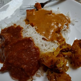 That Indian Place - lamb rogan josh(red), butter chicken, and aloo gobi (cauliflower and potatoes).  This is about a third of a portion - Indian Near Me - Koloa, Hawaii