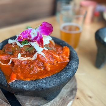 Agave Uptown - a bowl of food on a table - Mexican Near Me - Oakland, California
