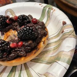 Del Cerro - San Diego - White bagel with homemade chocolate spread, blackberries, and pomegranate pieces