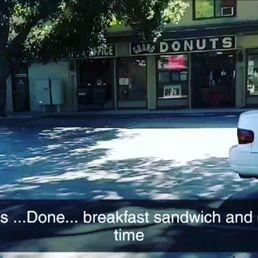 Walking into Grand Donuts, after my 3 mile walk, to get a breakfast sandwich and coffee... Thanks Lang and Tina! Walking into Grand Donuts, after my 3 mile walk, to get a breakfast sandwich and coffee... Thanks Lang and Tina!
