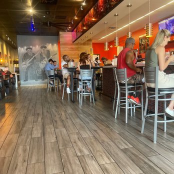 Rock N Roll Sushi - Inside of Bar. Makes you feel like your at a concert - Sushi Bars Near Me - Spring, Texas