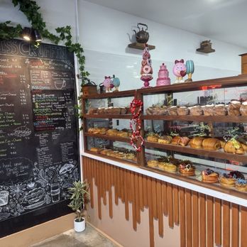 Miss Cruffin - Menu and Pastry shelf in the front area - Bakeries Near Me - Jacksonville, Florida