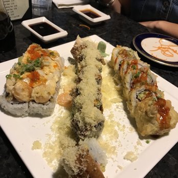 Sushi Lola's - Left TNT Roll, middle Crunchy Dragon Roll, right Rendezvous Roll - Sushi Bars Near Me - Orlando, Florida