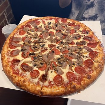 Larco Bros. Pizzeria - Large Round Pizza with mushrooms, Sausage, and Pepperoni  Yummy! - Pizza Near Me - Auburn Hills, Michigan