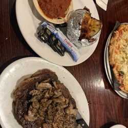 Pizza King - Ribeye steak with 2 sides ( spaghetti with meat sauce & loaded baked potato)