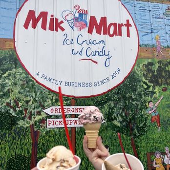 Mik Mart Ice Cream - two people holding ice cream cones - Food Trucks Near Me - Saint Paul Park, Minnesota Mik Mart Ice Cream - two people holding ice cream cones - Food Trucks Near Me - Saint Paul Park, Minnesota