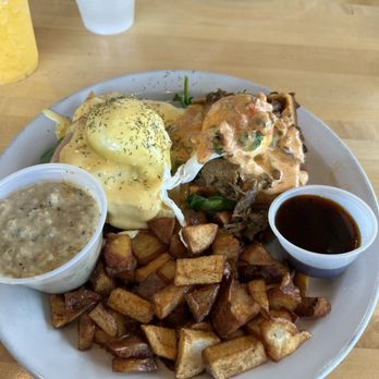 Munch Munch Waffles & More - Benedict duo with Carnitas on cornbread waffle, Spinach and Smoked Salmon with hollandaise, & home fries - Waffles Near Me - Liberty Hill, Texas Munch Munch Waffles & More - Benedict duo with Carnitas on cornbread waffle, Spinach and Smoked Salmon with hollandaise, & home fries - Waffles Near Me - Liberty Hill, Texas