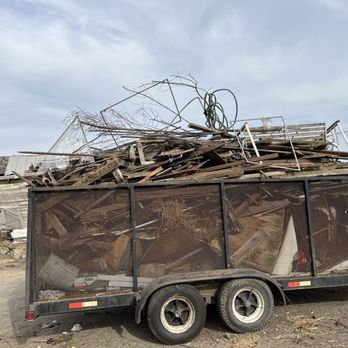 TRINITY LAWN CARE - One day worth of junk and wood hauled away - Gardeners Near Me