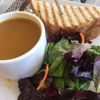 NM Café - Half a grilled cheese and tomato jam sandwich with half serving of soup. My boss has the other half. - New American Near Me - Las Vegas, Nevada