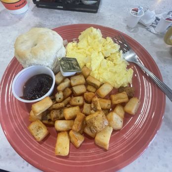 The Flying Biscuit Cafe - Scrambled eggs w/ onion, home fries and a biscuit. - Breakfast & Brunch Near Me - The Villages, Florida The Flying Biscuit Cafe - Scrambled eggs w/ onion, home fries and a biscuit. - Breakfast & Brunch Near Me - The Villages, Florida