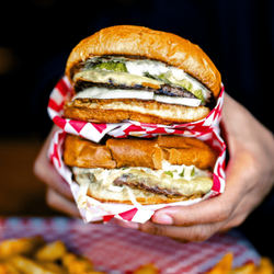 Detroit Axe - Corktown - Detroit Axe Corktown pairs high-energy axe throwing with crave-worthy food from The Corner Grill, creating a complete enterta...