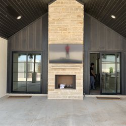Intelligent Home Solutions - Outdoor Fireplace TV Mount with color matched in ceiling speakers for patio