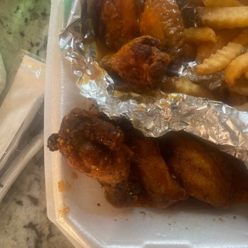 Wing Castle - If you look at the tips you can tell how old they are along with the color disfigurement ! $17 bucks WASTED!!!! - Chicken Wings Near Me - Lewisville, Texas