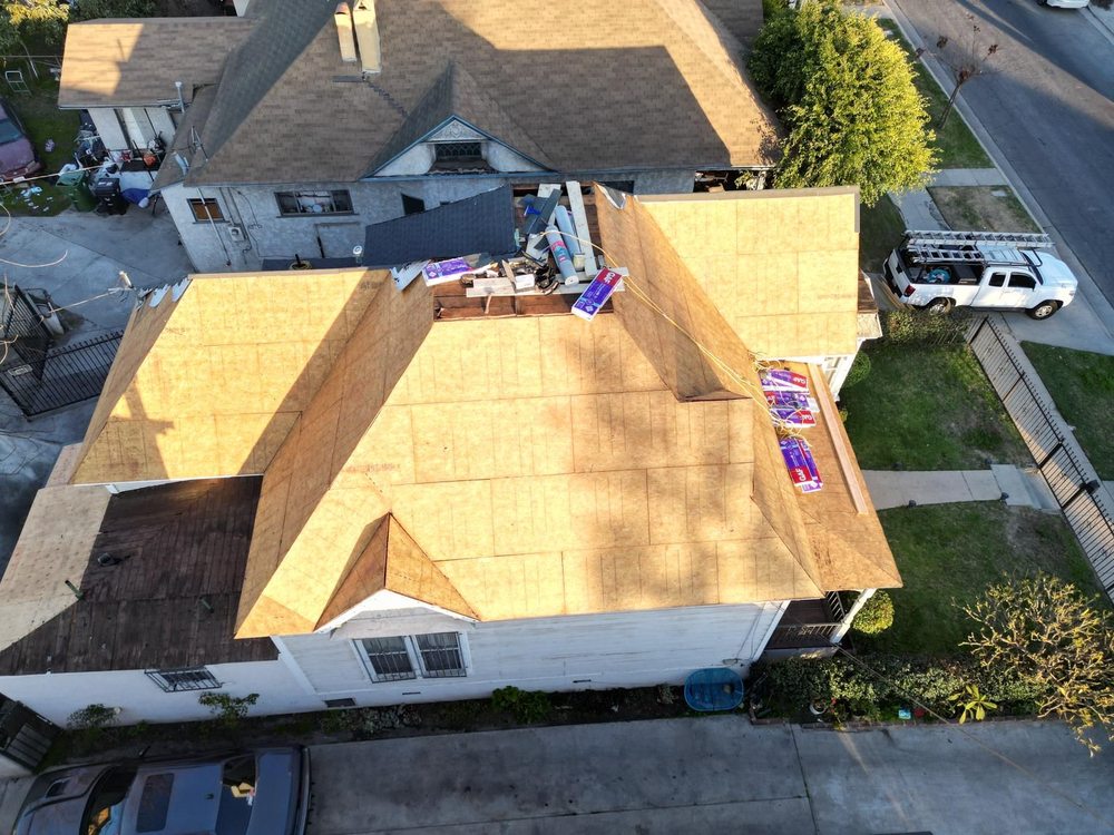 Slide of Tecun’s Roofing