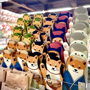 Kinokuniya Bookstore - Oven mitt critters all waving hi at ya :p - Bookstores Near Me - New York, New York