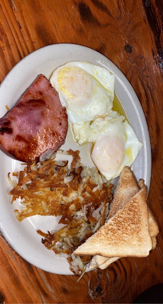 Manitas Restaurant Logo